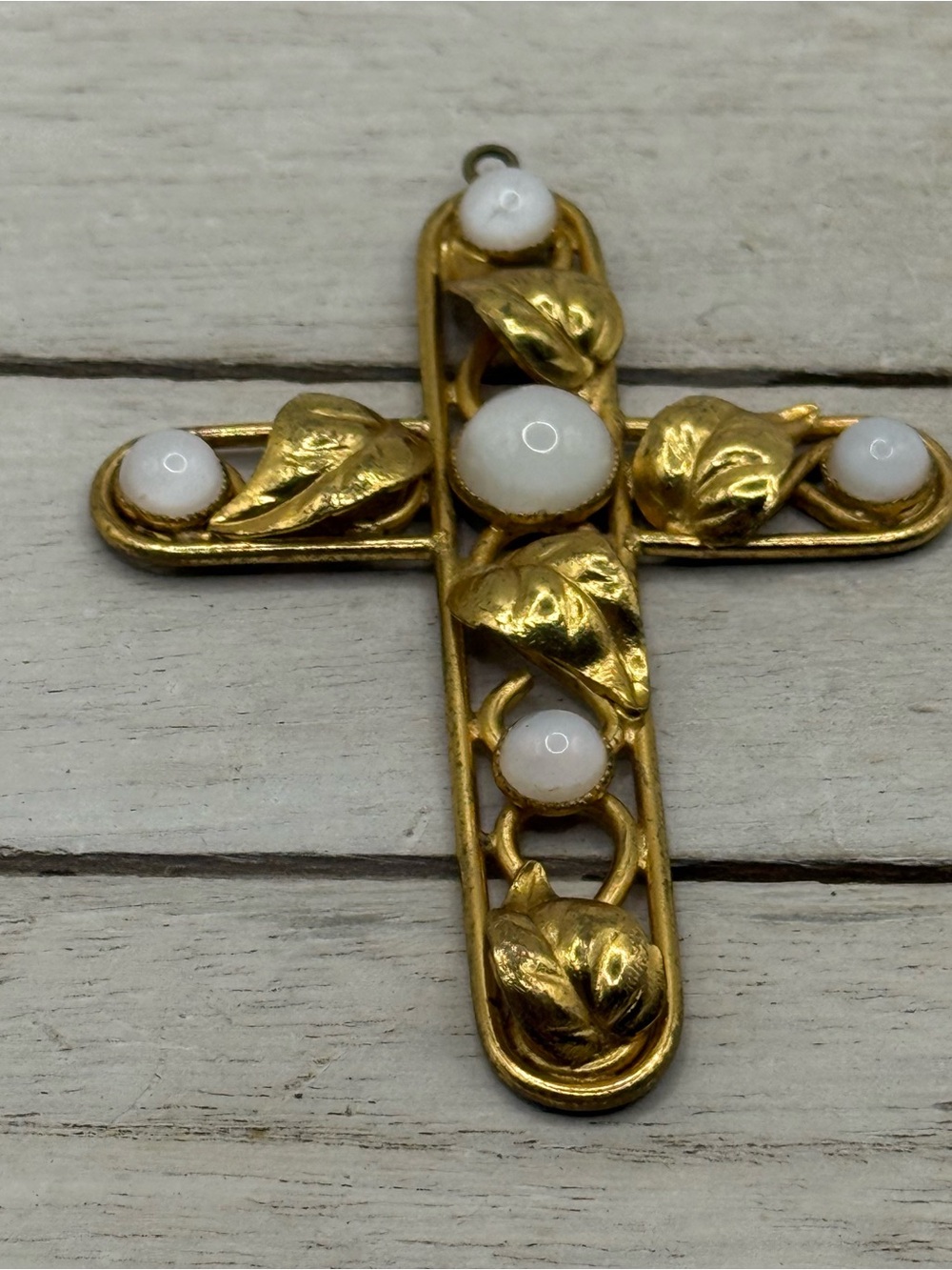 Gold Tone Cross with White cat eye Cabochons pendant